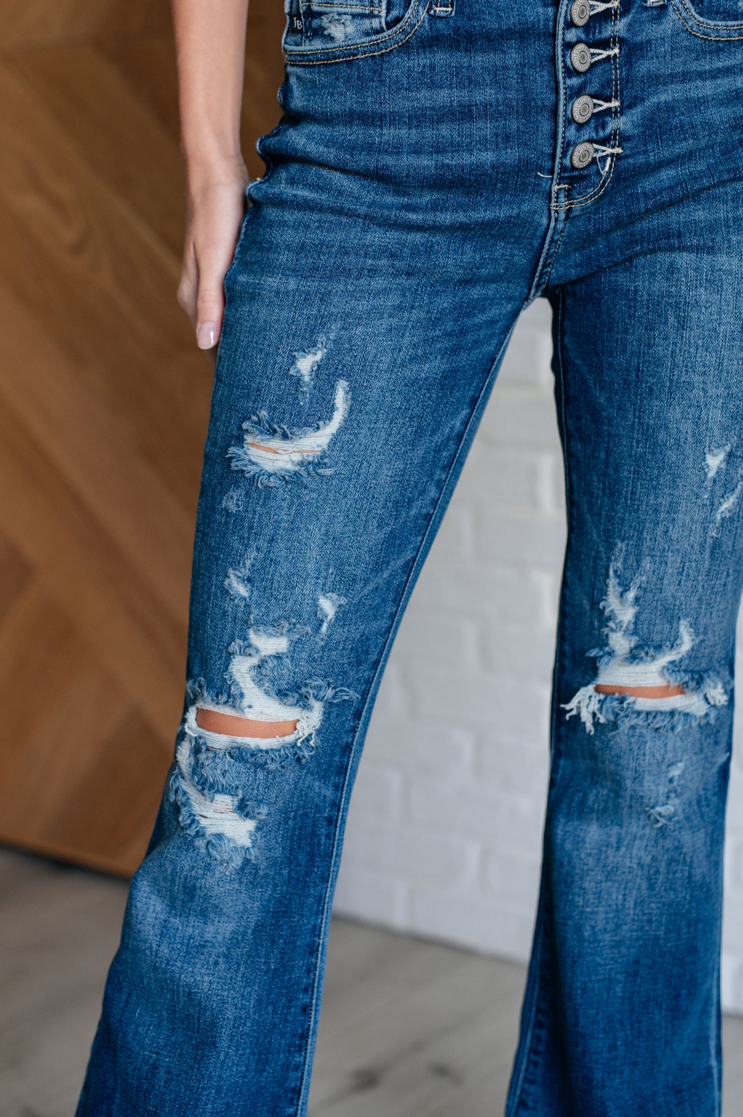 Gabriella Mid Rise Distressed Button Fly Flare Jeans!