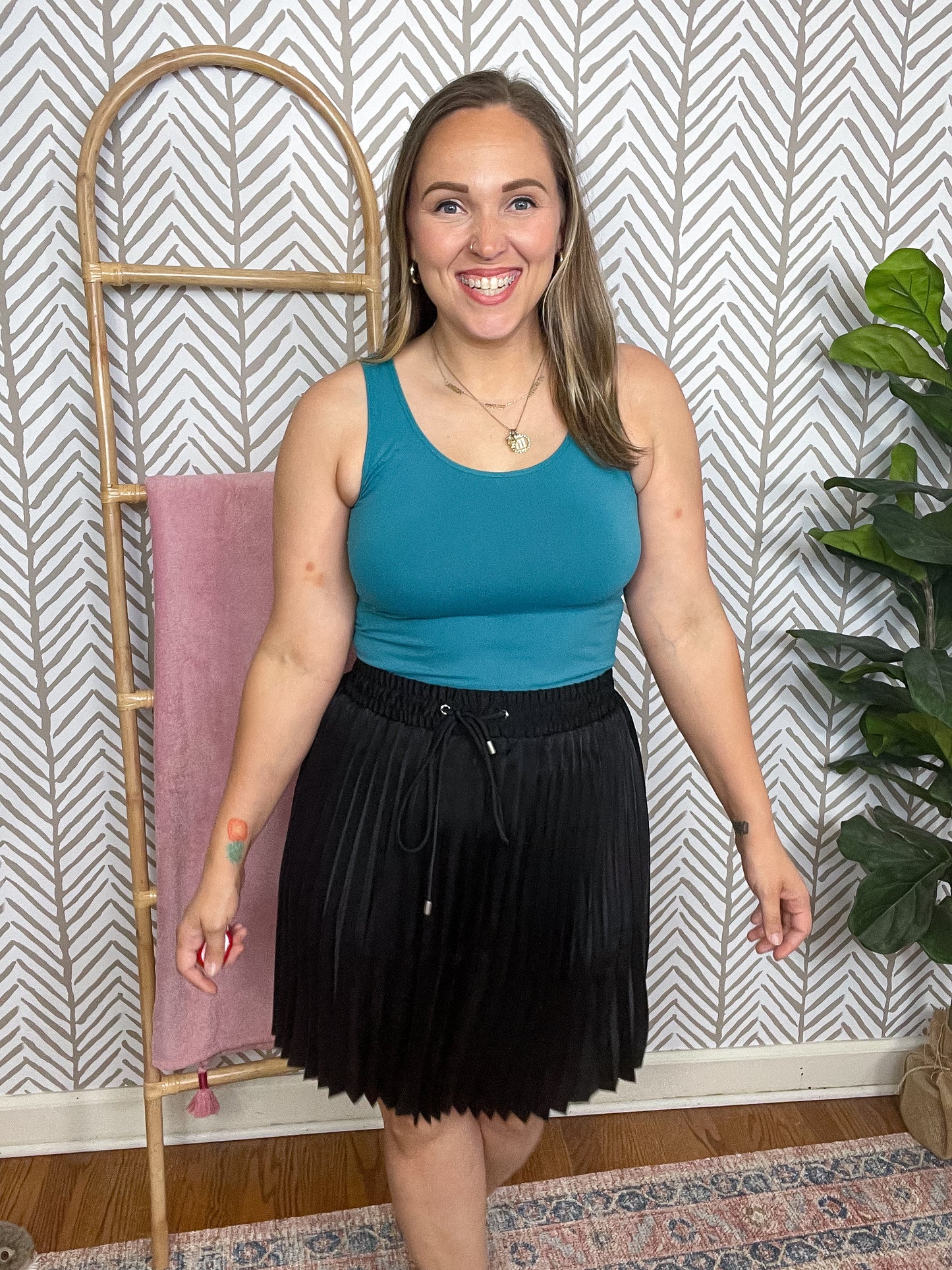 Just a Flirt Pleated Skirt in Black