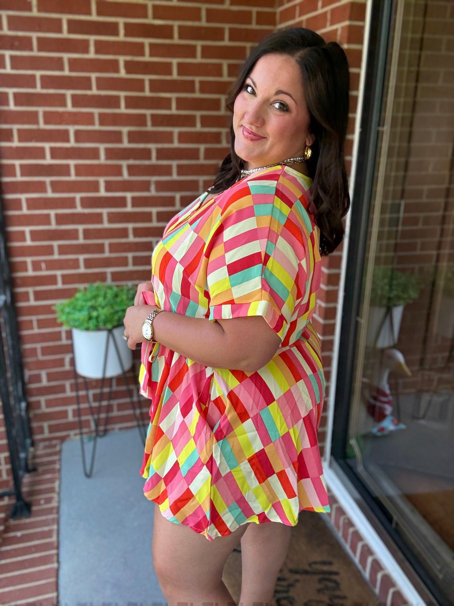 Eyes On You Coral Geo Abstract Surplice Woven Romper