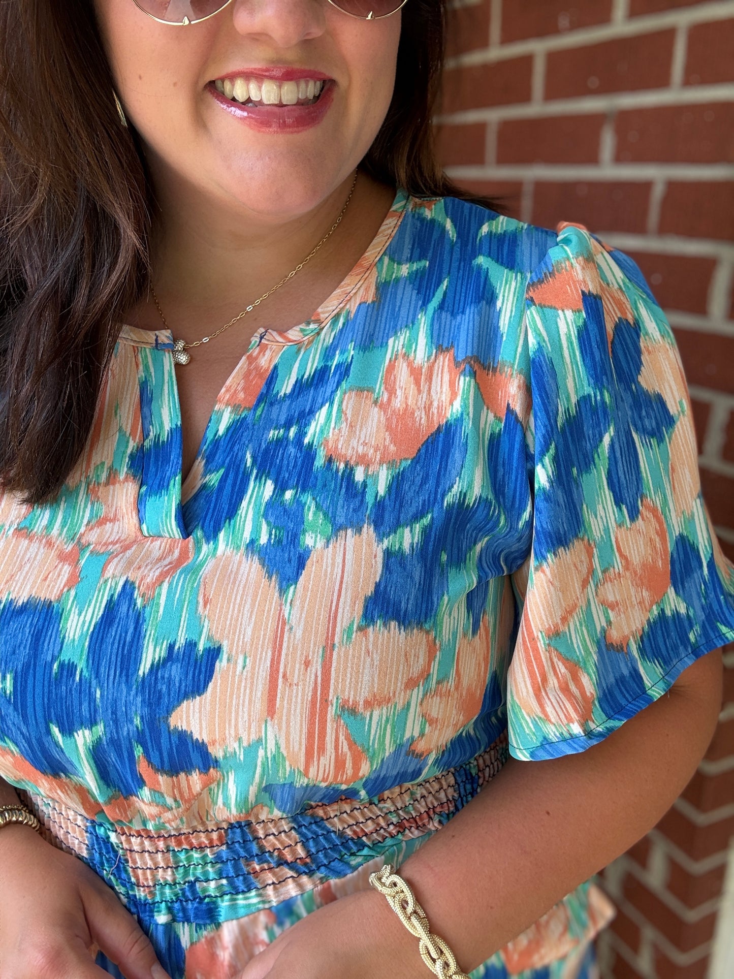 Feeling Bold Turquoise Floral Smocked Waist Flutter Sleeve Romper