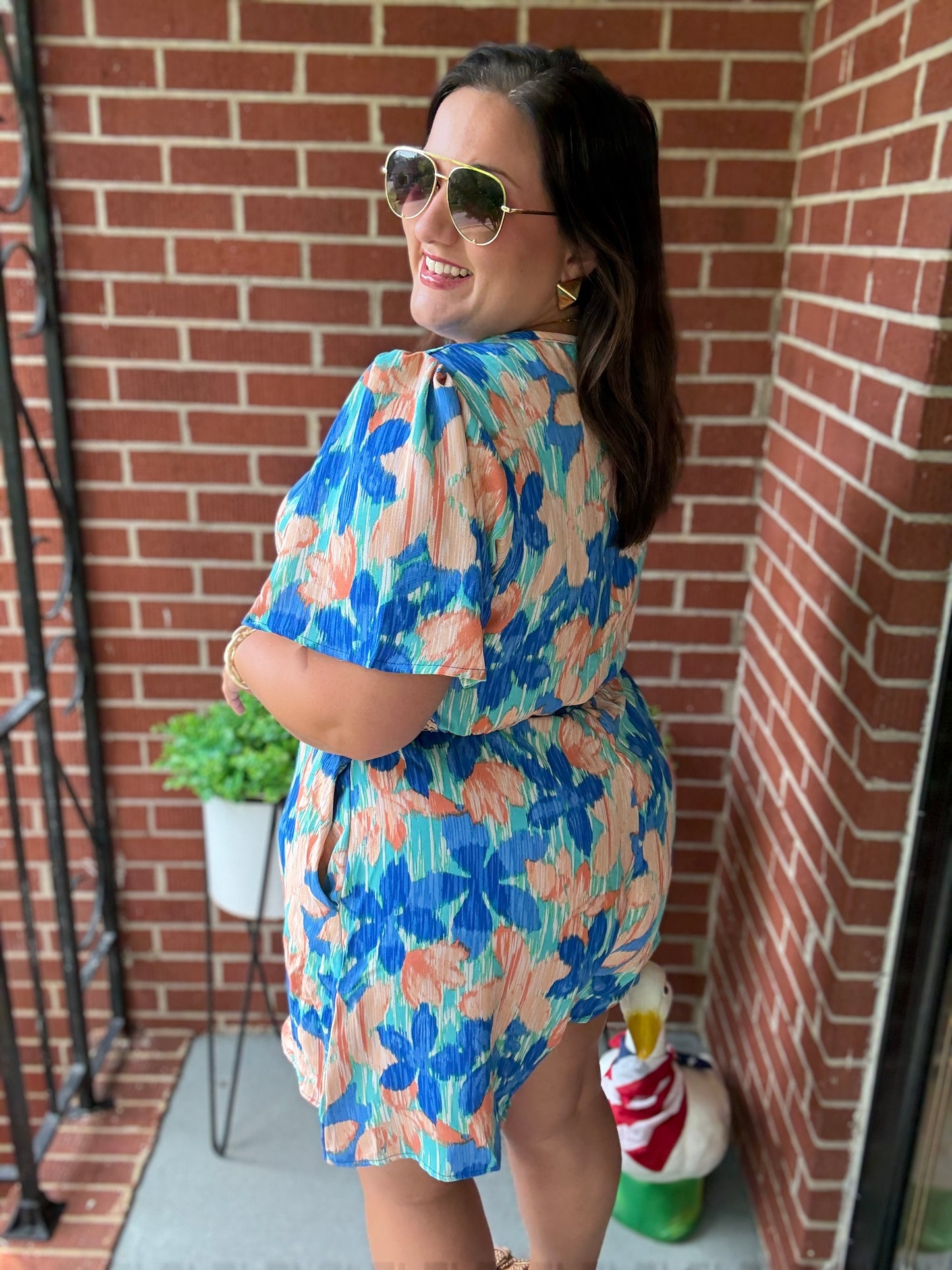 Feeling Bold Turquoise Floral Smocked Waist Flutter Sleeve Romper